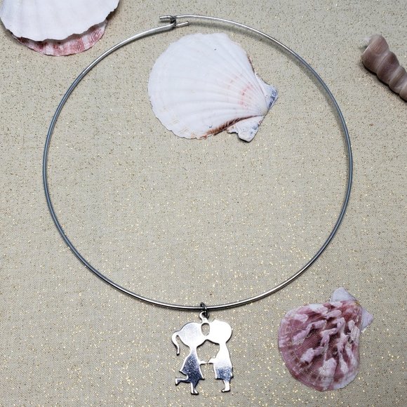 Vintage Jewelry - Vintage silver plated boy girl kissing necklace